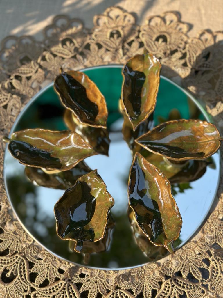 Leaf diya's bottle green colour