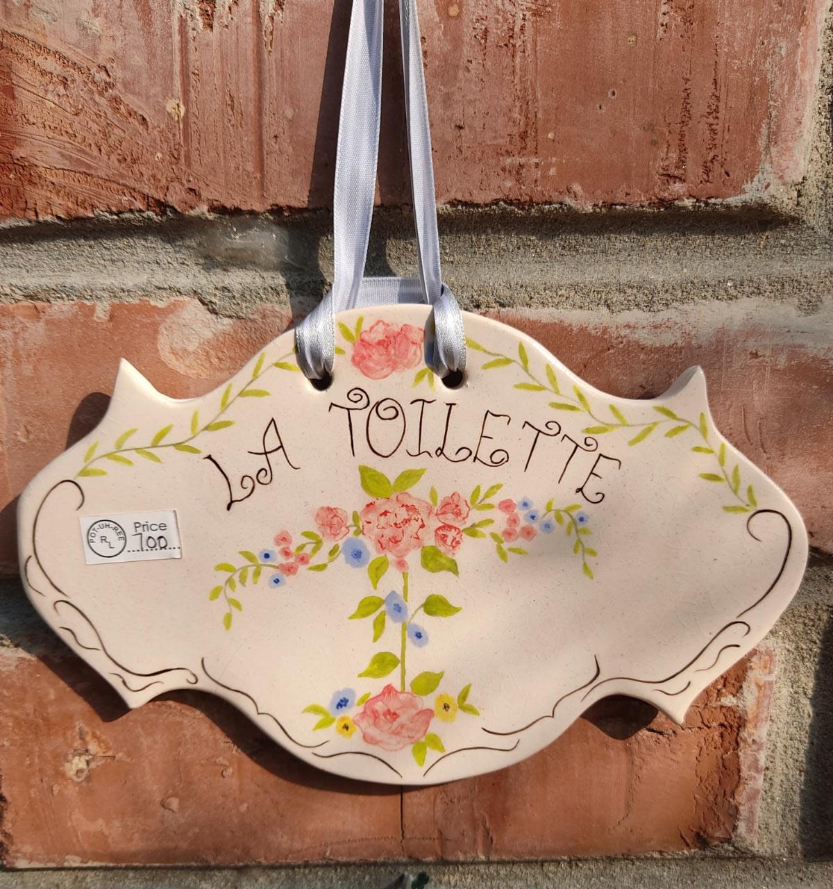 Oval hanging plate