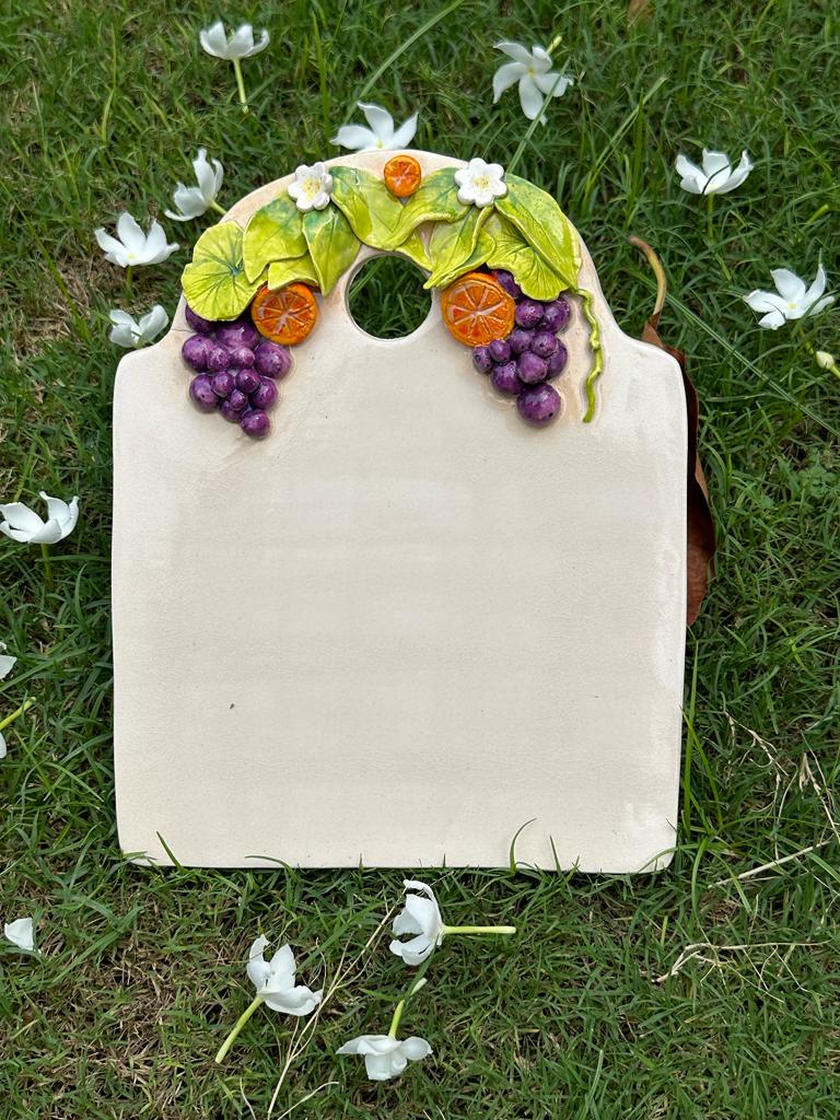 Grapes with orange chesse board