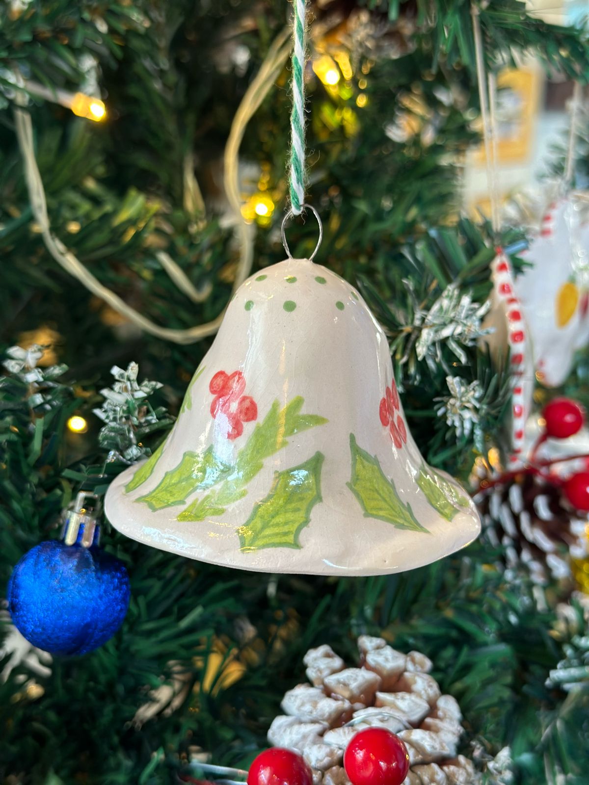Bell with green leaves