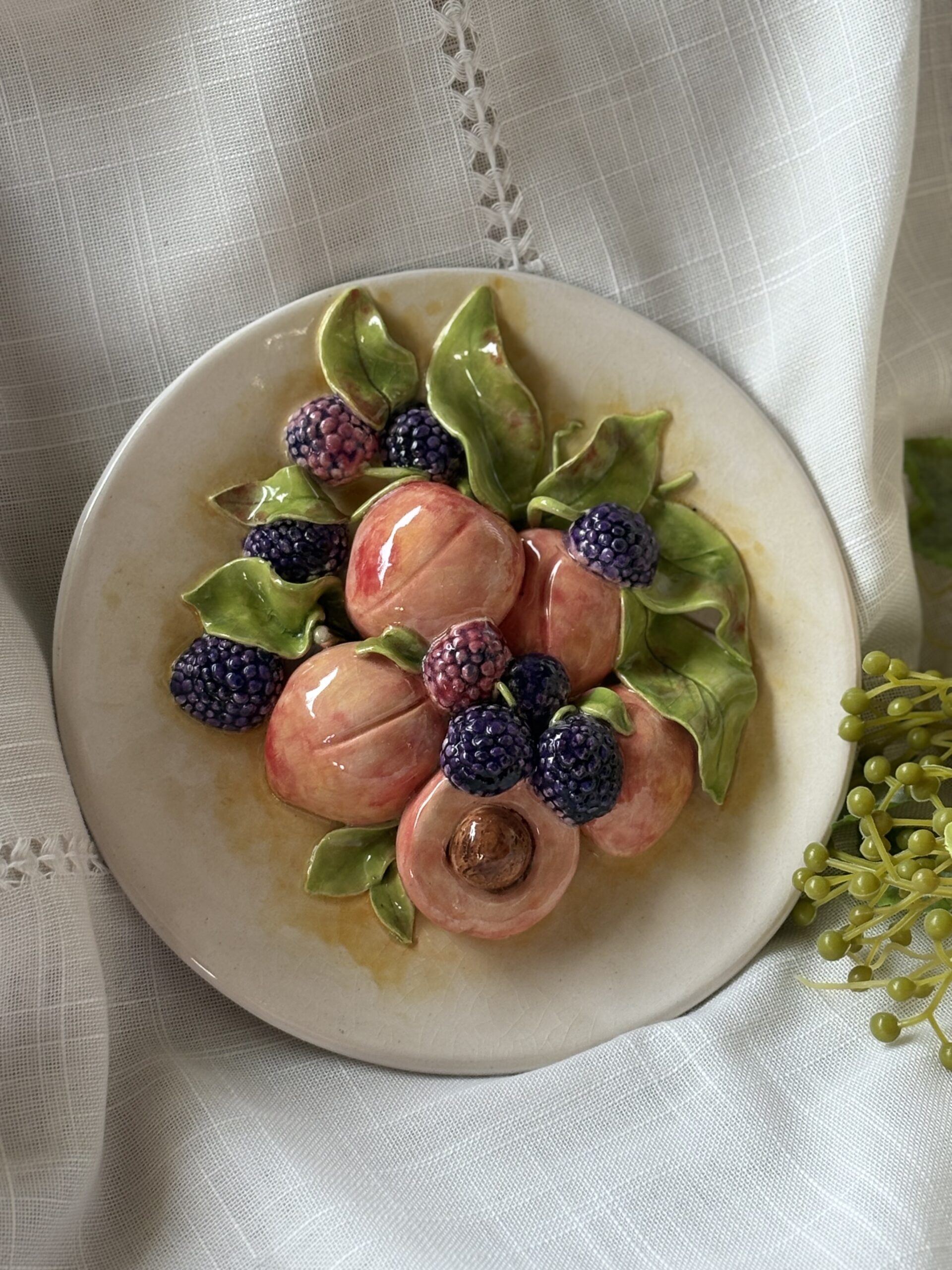 3D wall plate with peaches and rasberries