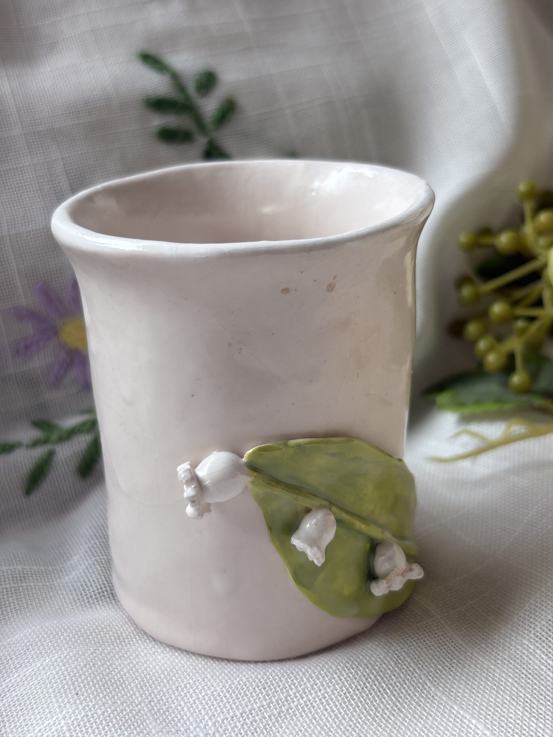 Glass with Lily of the valley