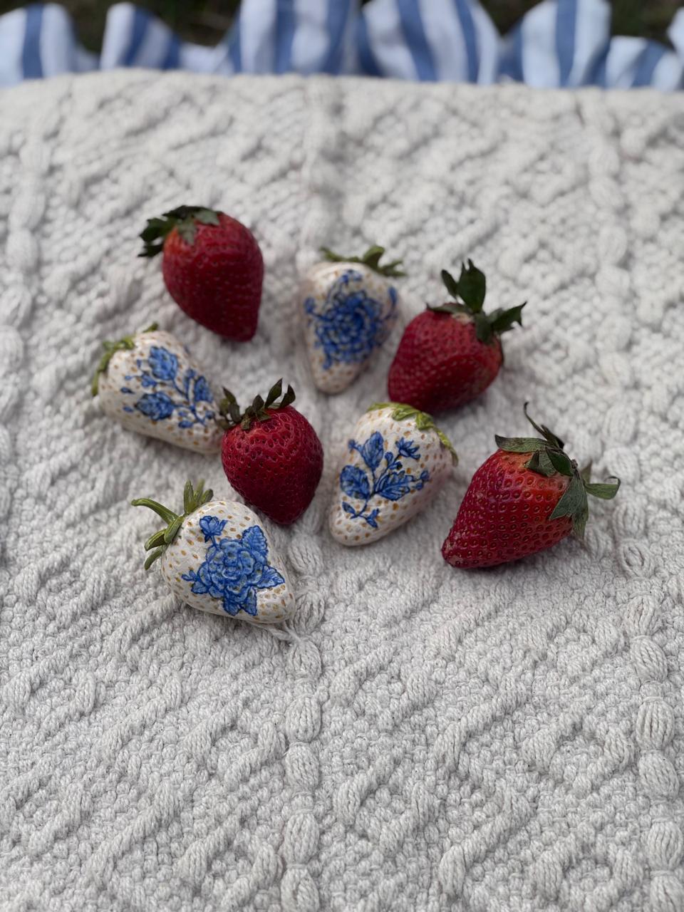 Blue painted strawberries