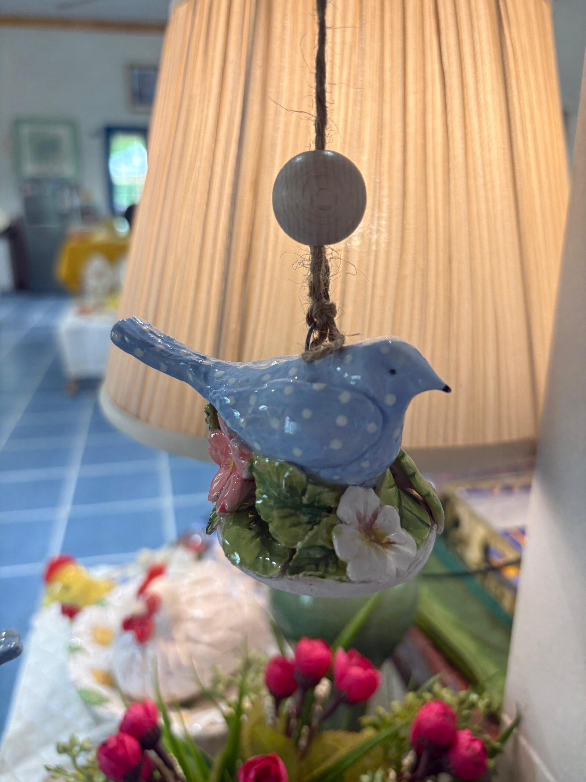 Blue bird hanging