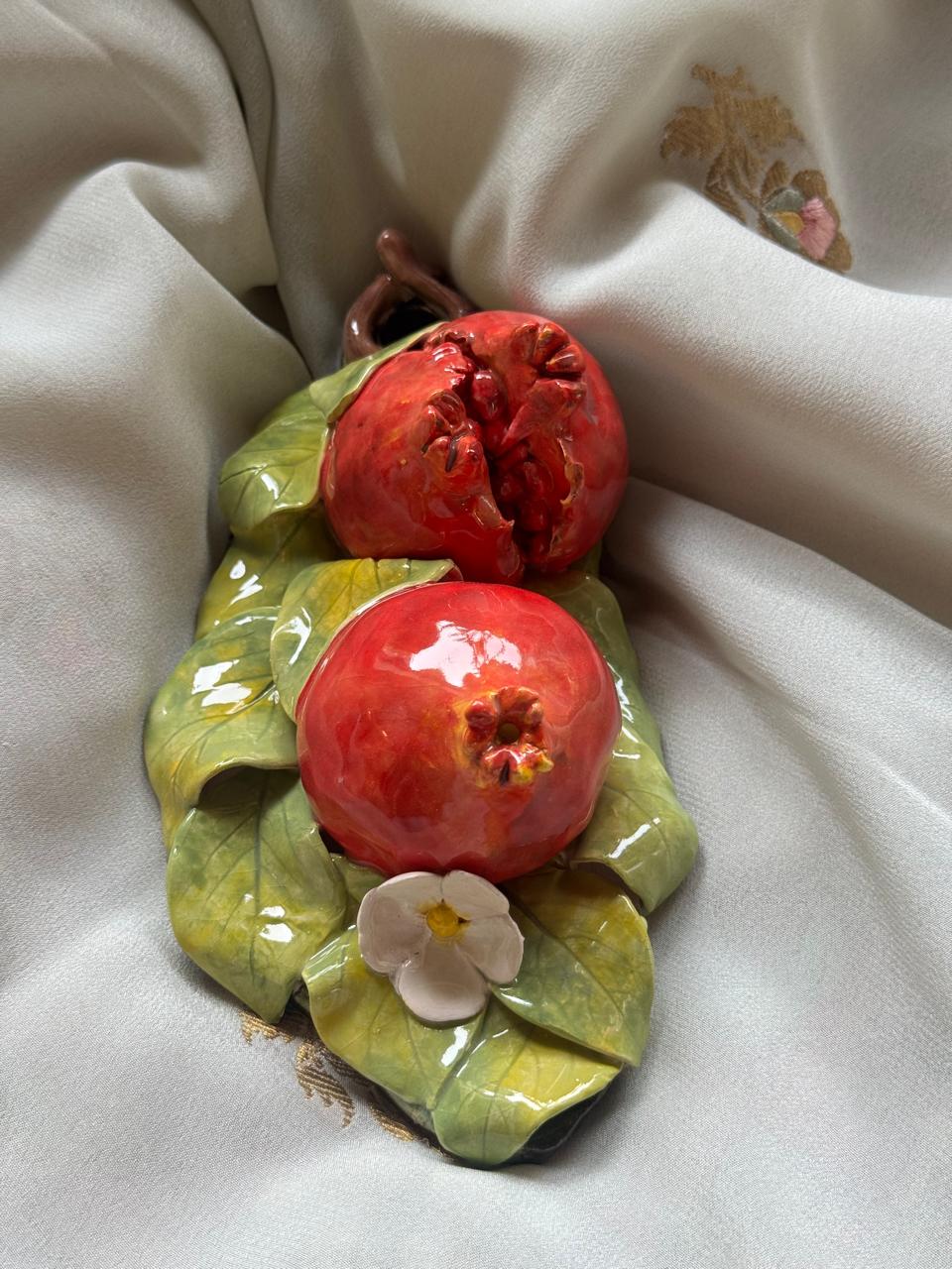 Pomegranate with leafs hanging
